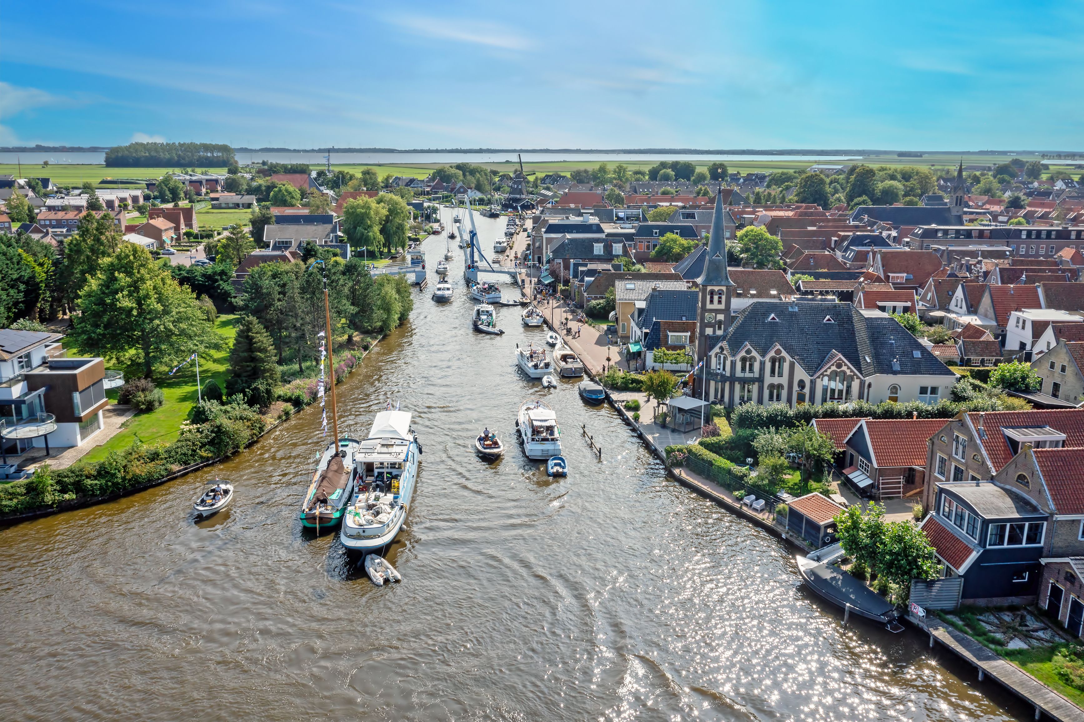 Aerial from the historical village Woudsend on a summer day in Friesland the Netherlands