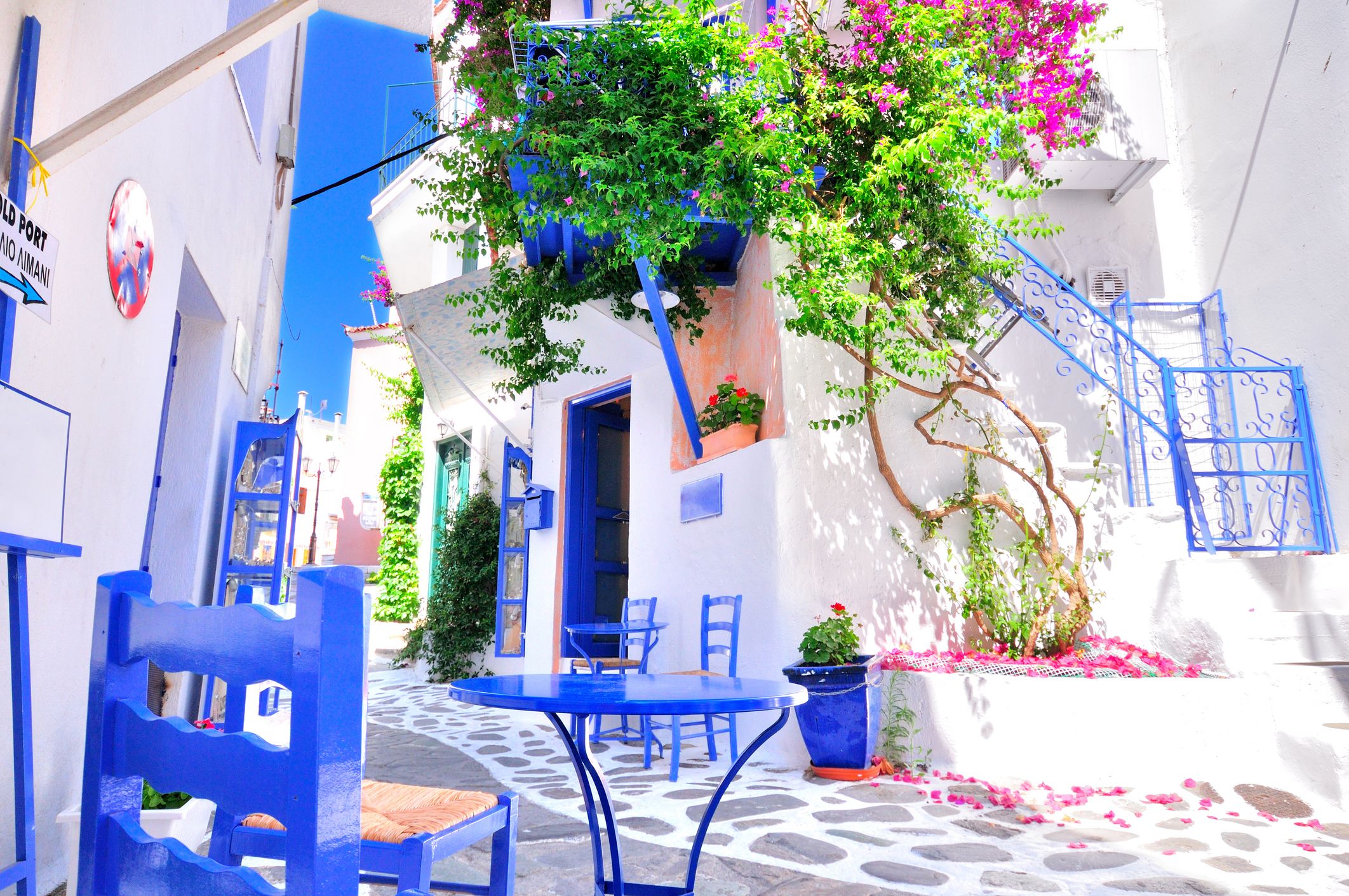 Traditional greek architecture in a narrow alley in Skiathos town, Sporades archipelago,