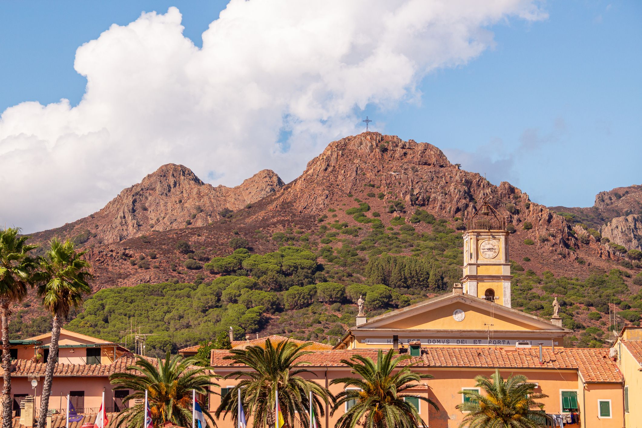 View to church of Saint James (chiesa di San Giacomo) and monte della croce seen from harbor of Porto