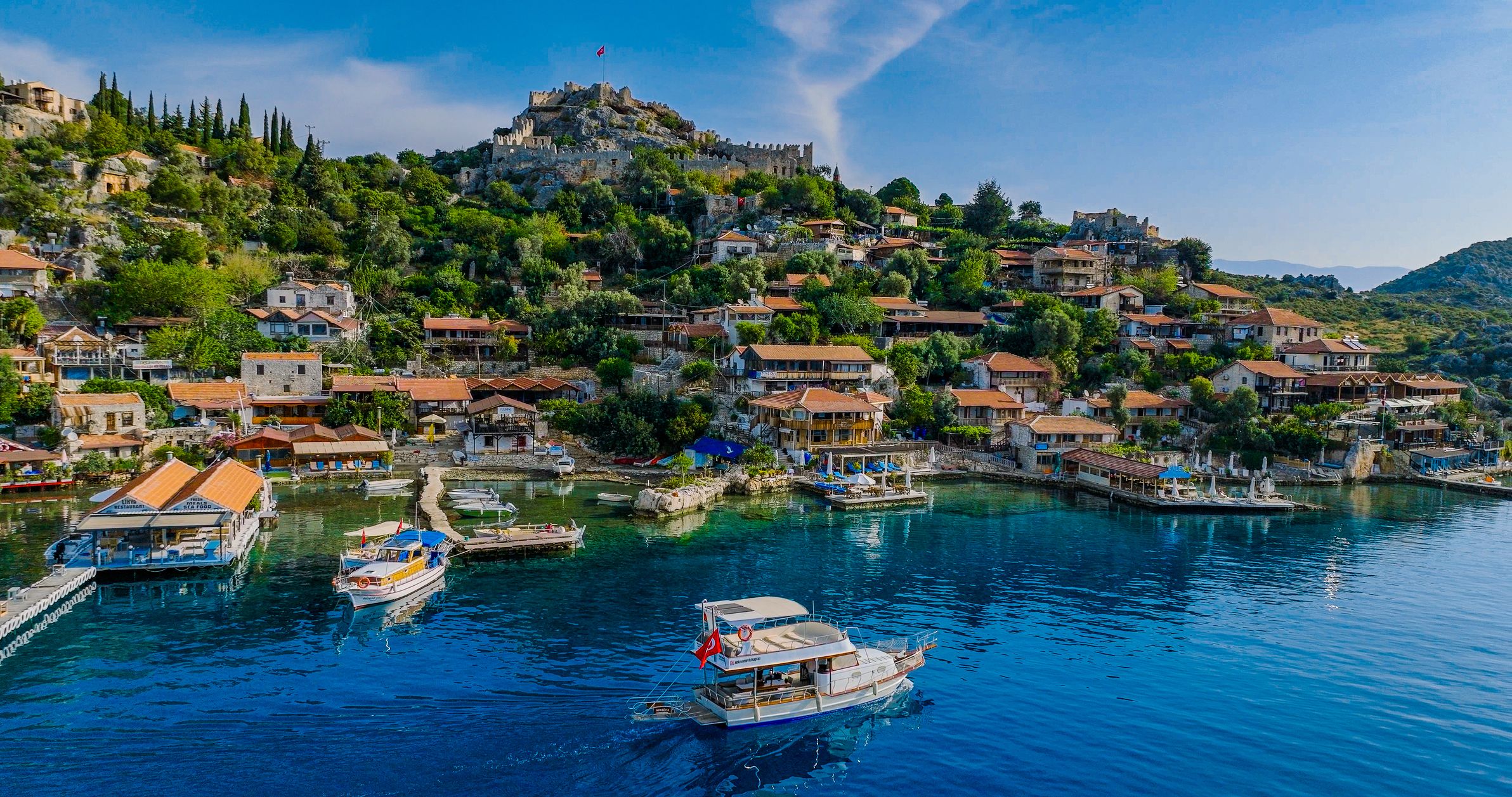 Kaleköy (literally "Castle's village" in Turkish; Ancient Greek: Σίμηνα - Simena) is a village of the Demre district in the Antalya Province of Turkey