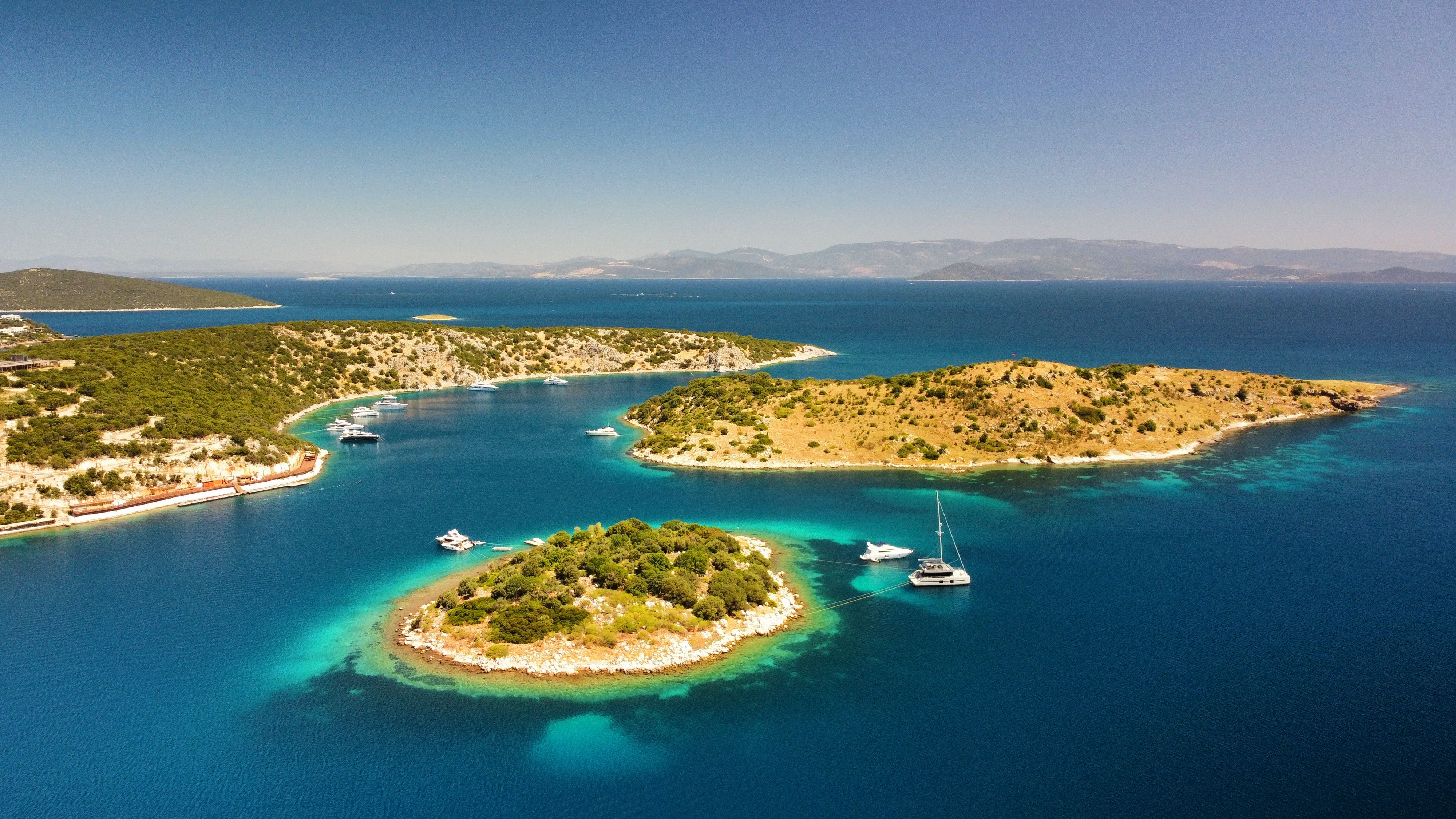 Aegean Sea and Bodrum Yalikavak aerial view. Yalikavak Bodrum Mugla Turkey. Bodrum Yalikavak small island and big island aerial view. Mugla Turkey