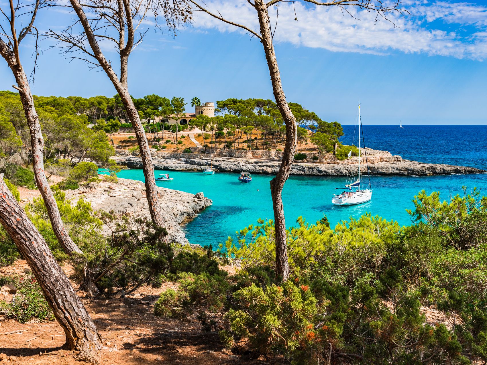 A beautiful bay with a sailboat on the island of Majorca, Spain