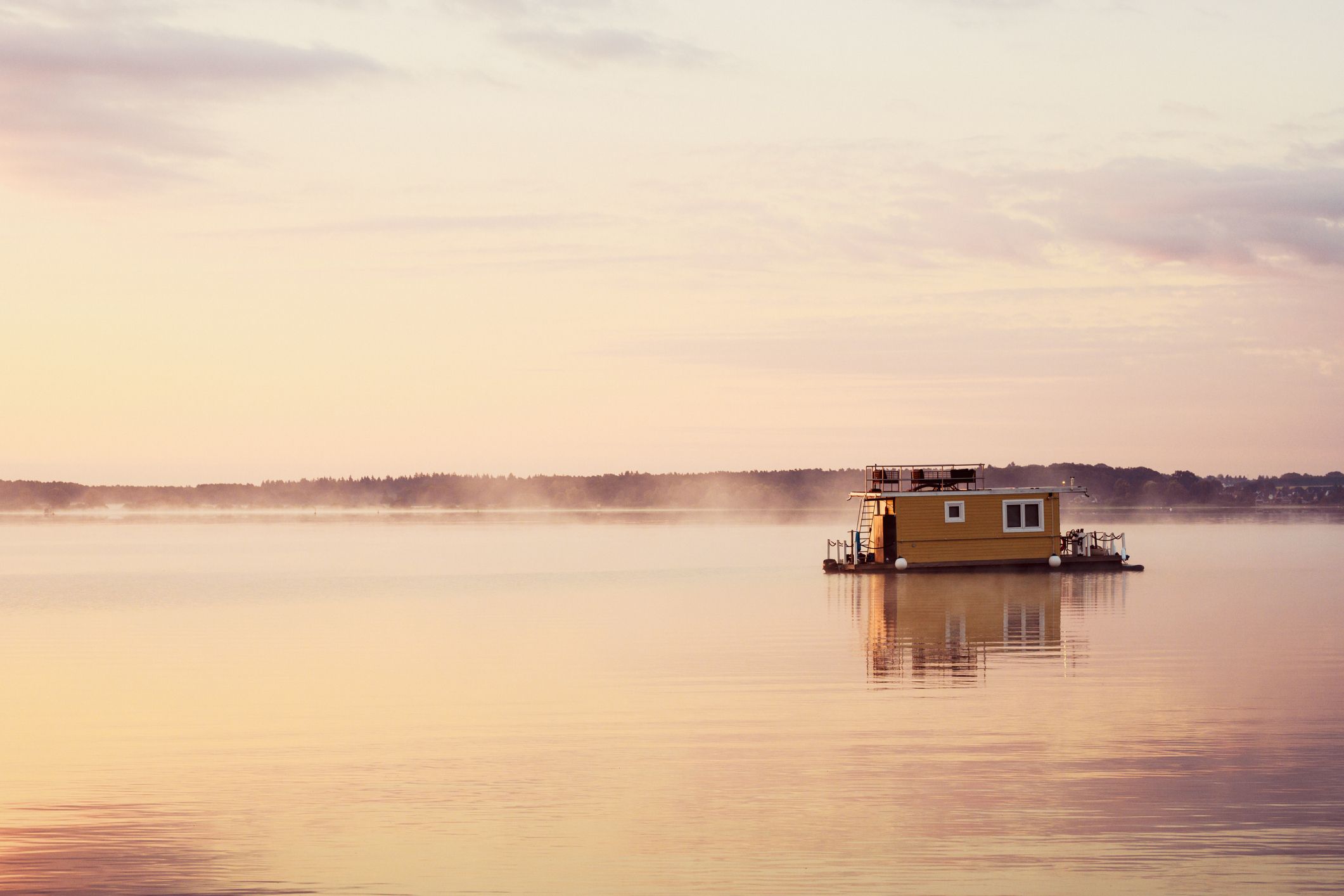 Houseboat on lake in Mecklenburg-Vorpommern, Germany, Summer vacations
