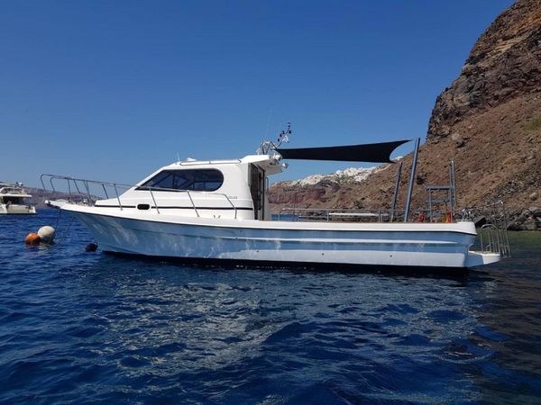 Santorini: 3-Timers Motorbåtcruise med å Se På Solnedgangen